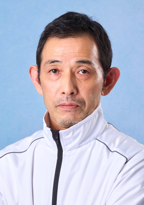 三角 哲男
